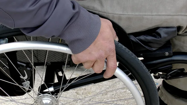 wheelchair, disabled, someone with reduced mobility, man, promenade, hand, wheelchair, wheelchair, wheelchair, wheelchair, wheelchair, disabled. How the Equality Act and EHRC guidance shape UK public-sector landing pages