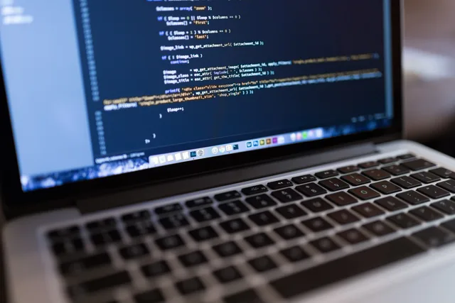 Focused view of programming code displayed on a laptop, ideal for tech and coding themes. Four testable hypotheses for where landing page software work exists in England