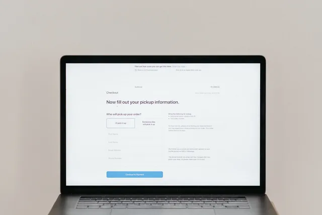 A laptop displaying an online checkout form, highlighting technology and e-commerce. Nobody has measured England's landing page software market, so here is what you can do