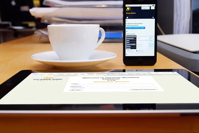 coffee, office, work, iphone, communication, mobile, smart phone, table, process, signature, e-signature, company, surface, workflow, application, in the morning, chronos systems, chronos workflow, paperless, paperwork, startup, signature, workflow, paperless, paperless, paperless, paperless, paperless. Landing page software operating workflow: brief to archive