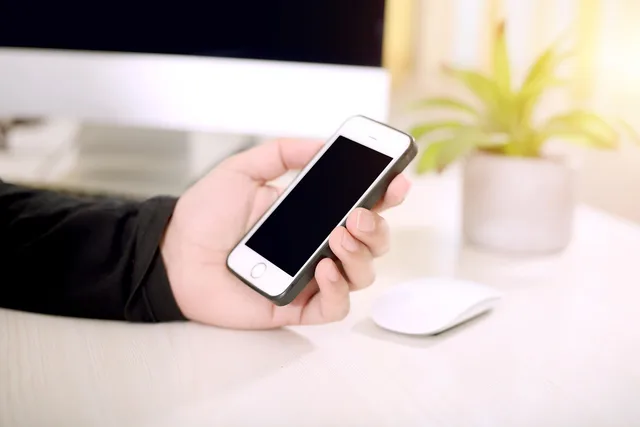 smartphone, hand, iphone, phone, phone mockup, phone in hand, ios phone, closeup. Do I need a landing page for my UK local business?